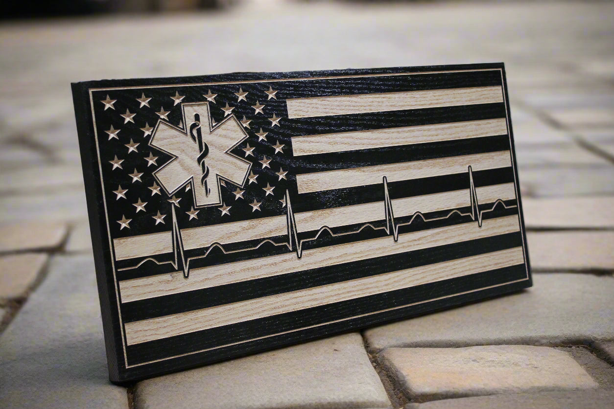 carved Ems wood flag with heartbeat design