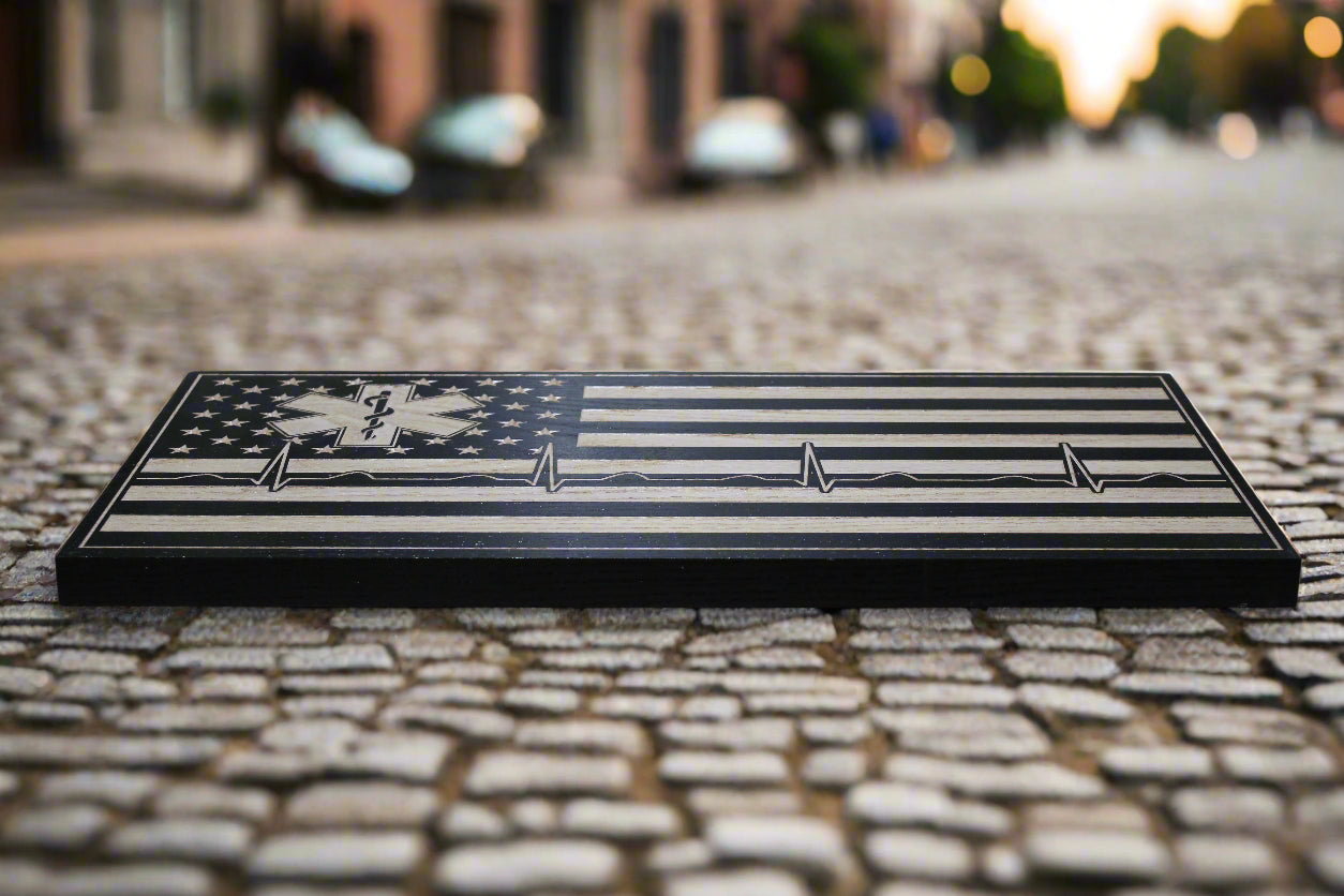 carved Ems wood flag with heartbeat design