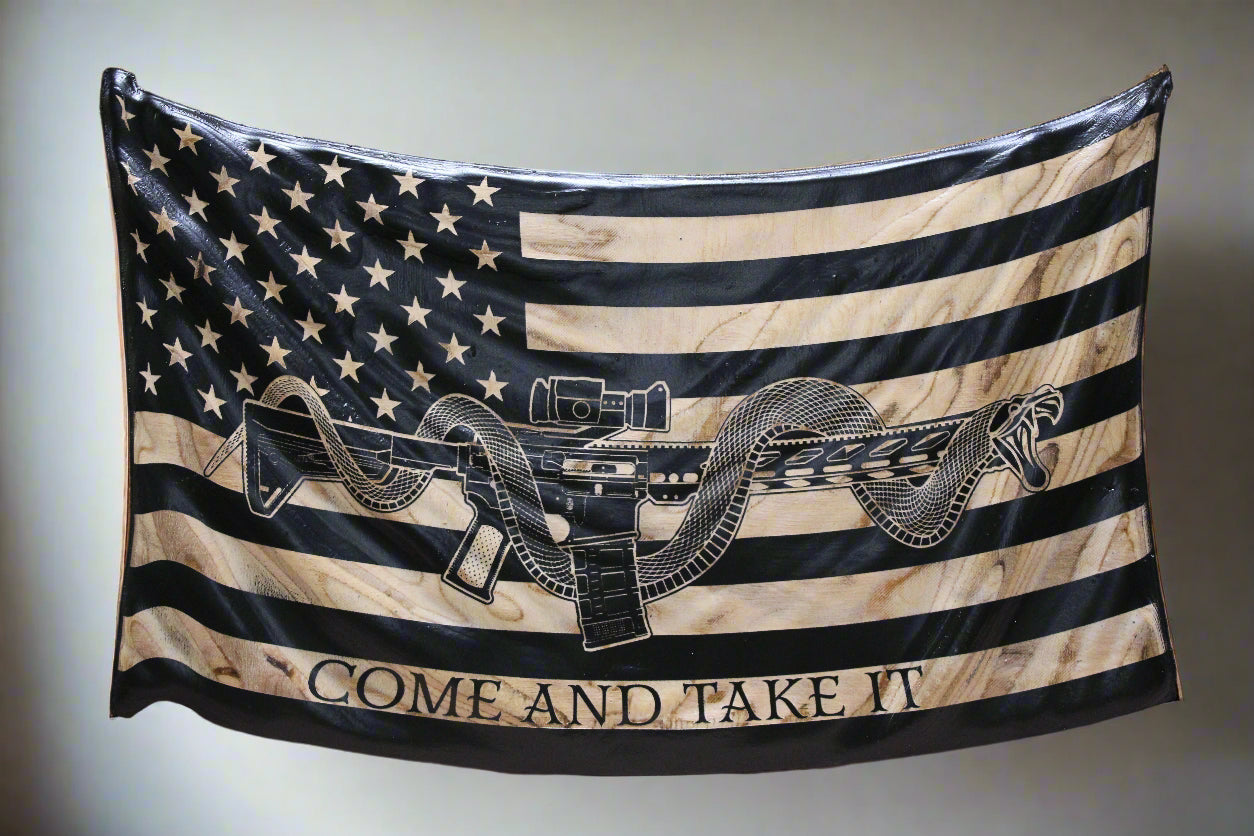 carved wavy “Come and Take It” wooden flag with M4 rifle & coiled snake, rustic patriotic wall art
