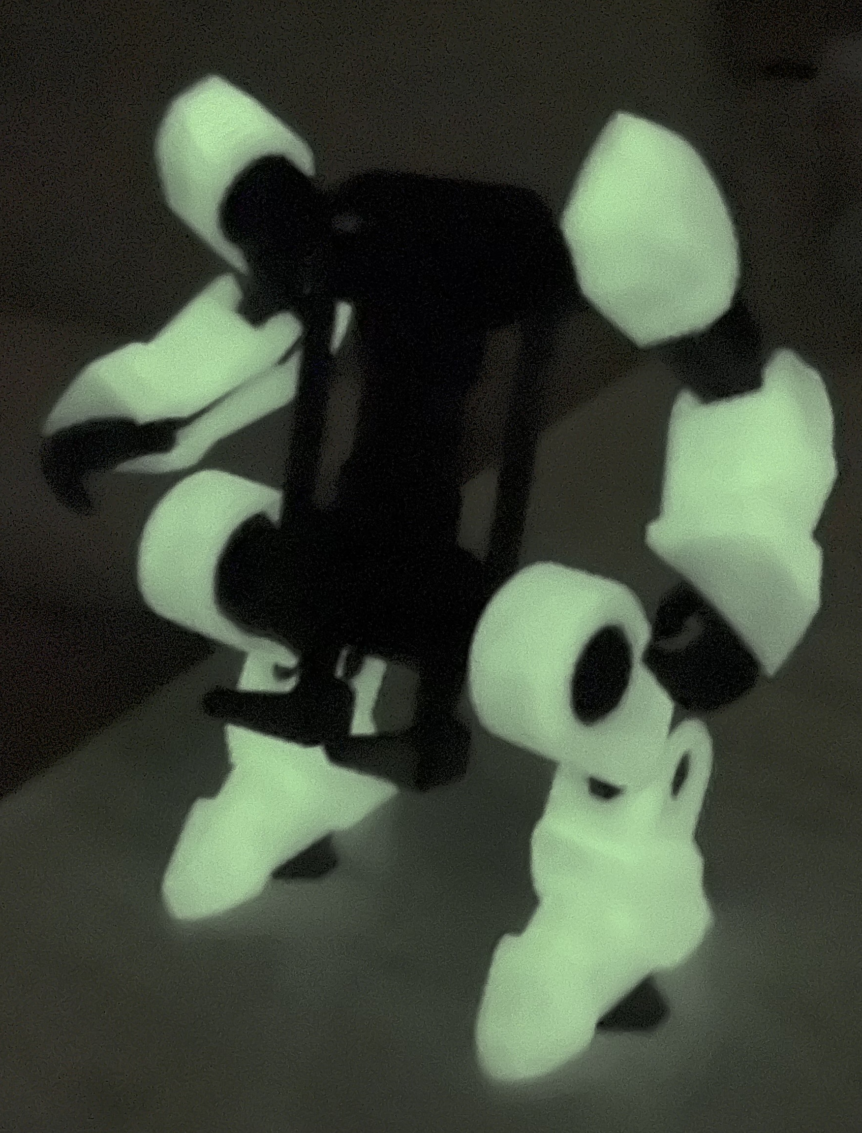 White Glow In The Dark And Galaxy Black Exo Suit Phone Holder